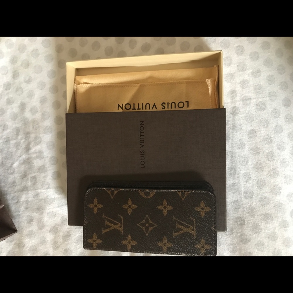 - Louis Vuitton cell phone case/folder great condition